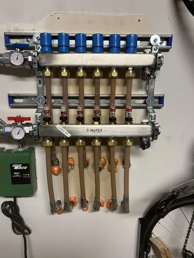 Plumber performing Water Heater Repair at a residential property in Mount Vernon